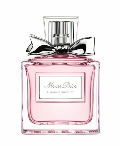 A little pink bottle of "Miss Dior Blooming Bouquet", a floral fragrance that smells like first the ...