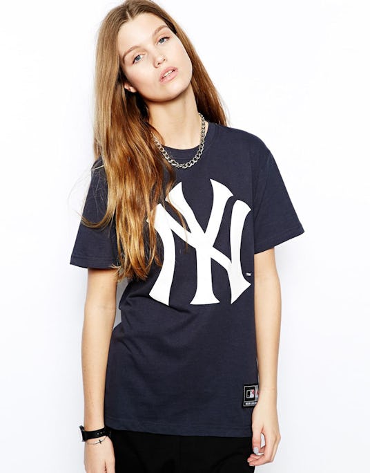 A brunette model wearing a Majestic NYC Tee 