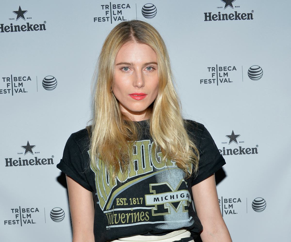 Dree Hemingway wearing Michigan Wolverines T-Shirt in combination with a zebra print skirt 