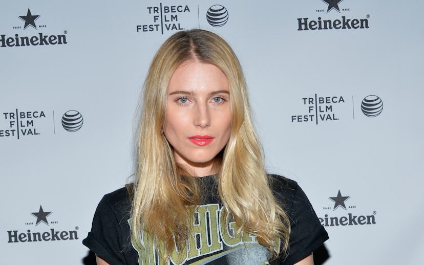 Dree Hemingway wearing Michigan Wolverines T-Shirt in combination with a zebra print skirt