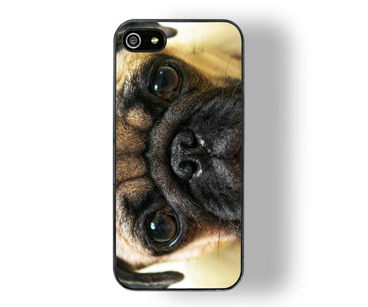 Phone case with a pug's face on it 