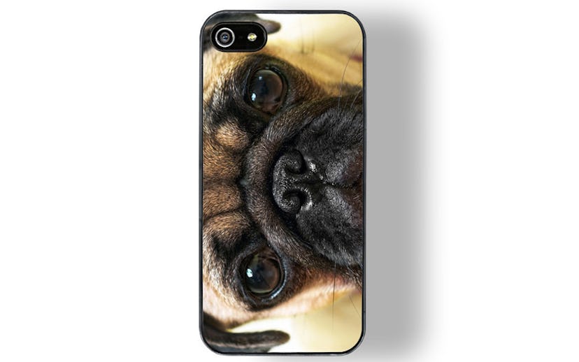 Phone case with a pug's face on it 