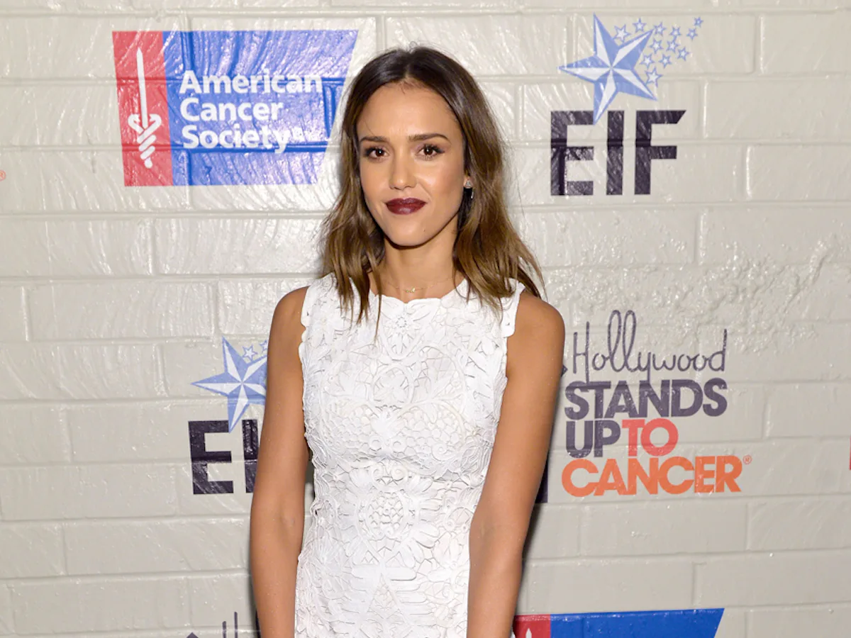 Jessica Alba in a White Lace Dress with Black Accessories Jessica Alba in a White Lace Dress with Black Accessories