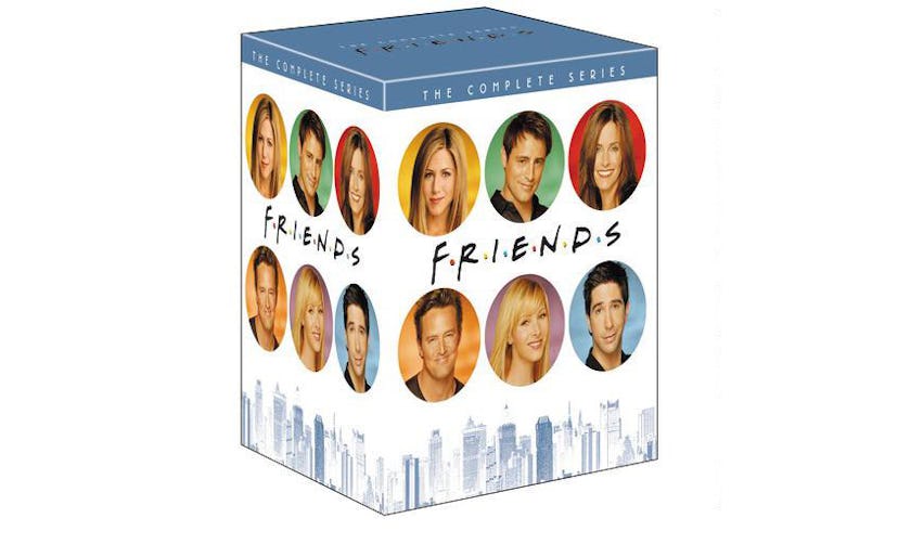 A White box with photos of Friends main characters and Manhattan building print