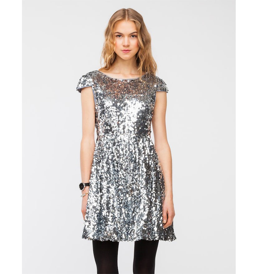 A silver sequin skater dress