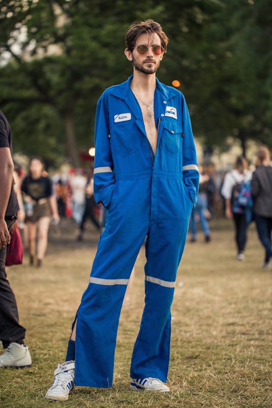 Man wearing a cobalt-blue jumpsuit