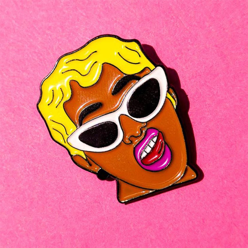 A pin of Cardi B sticking her tongue out by GRL TRBL 