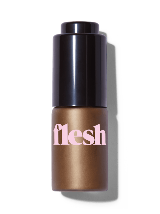 Flesh Beauty's Ripe Flesh Glisten Drops in transparent packaging with a black lid and pink writing 