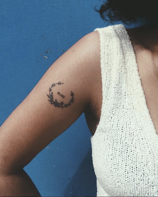 Laurel wreath tattoo on a woman tattooed by Rosa Perr.