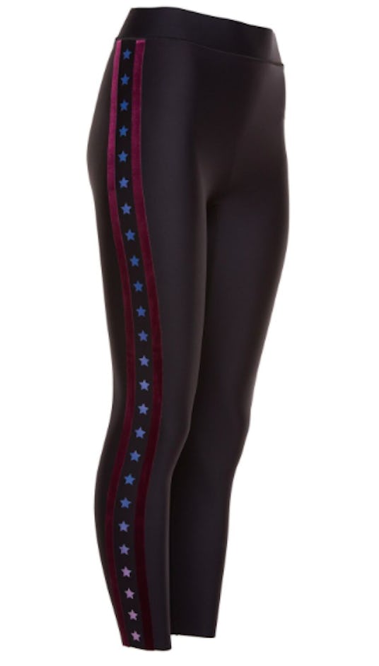 Black Ultracor leggings with red stripes and blue-to-pink gradient stars down the side