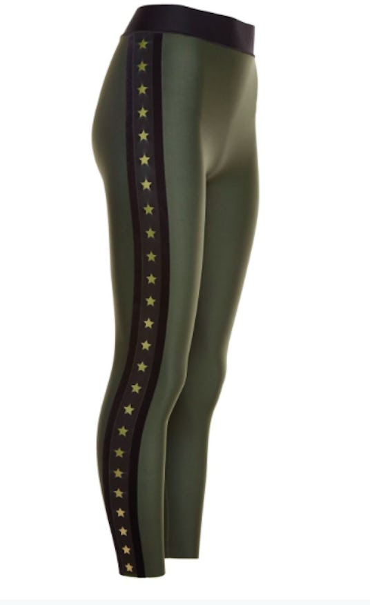 Army green Ultracor leggings with black stripes and gold stars down the side