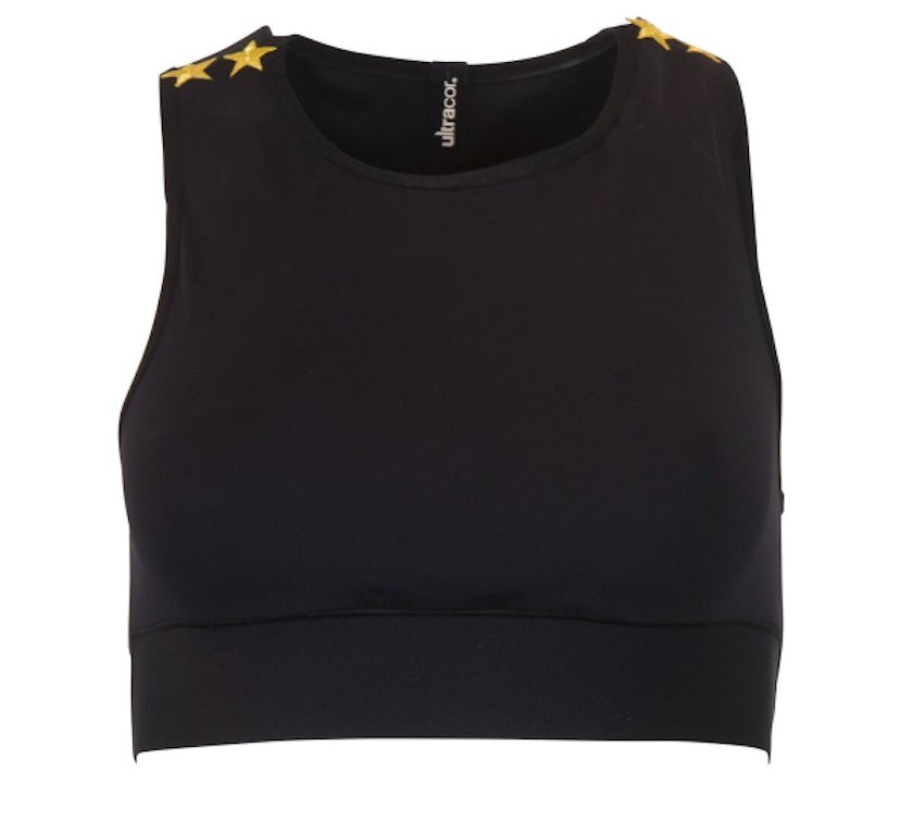Black Ultracor workout top with two gold stars on each shoulder strap