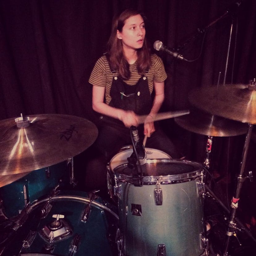 Victoria Mandanas playing drums