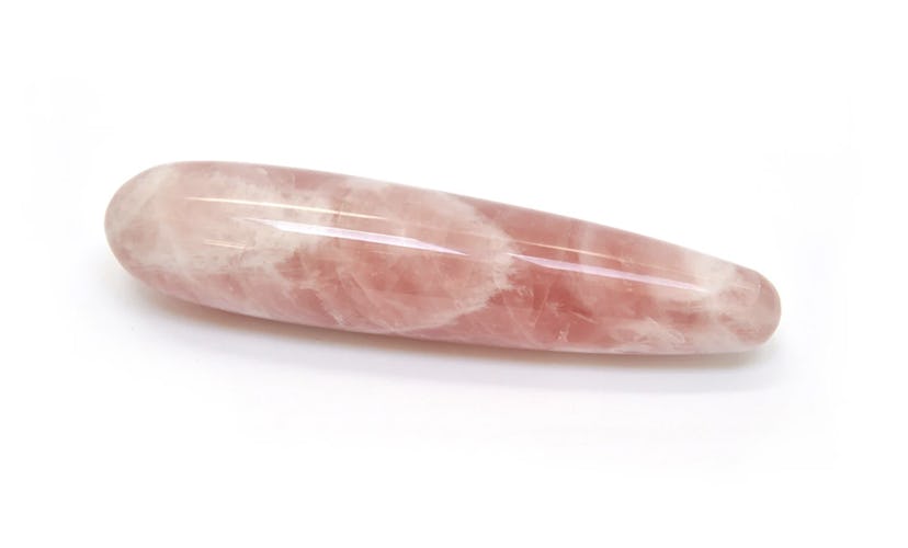 Rose Quartz crystal in the shape of a dildo or a butt plug
