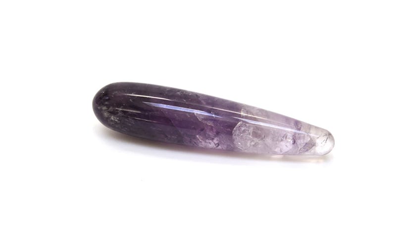 Amethyst crystal in the shape of a dildo or a butt plug