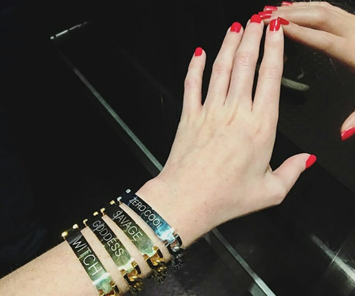 NYLONshop x Tawnie & Brina Collaboration, hands showing off four different metal bracelets