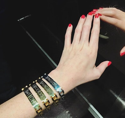 NYLONshop x Tawnie & Brina Collaboration, hands showing off four different metal bracelets