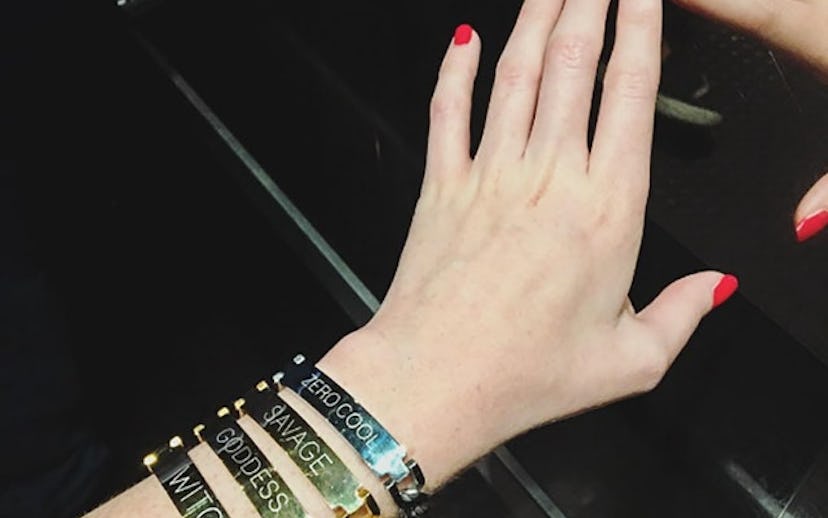 NYLONshop x Tawnie & Brina Collaboration, hands showing off four different metal bracelets