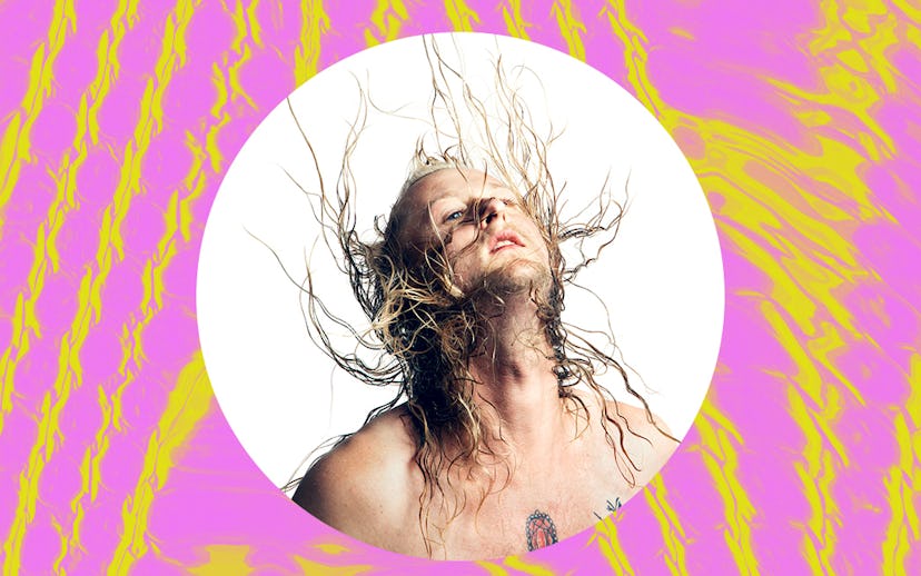 Colin Self posing with wet hair while moving his head backwards