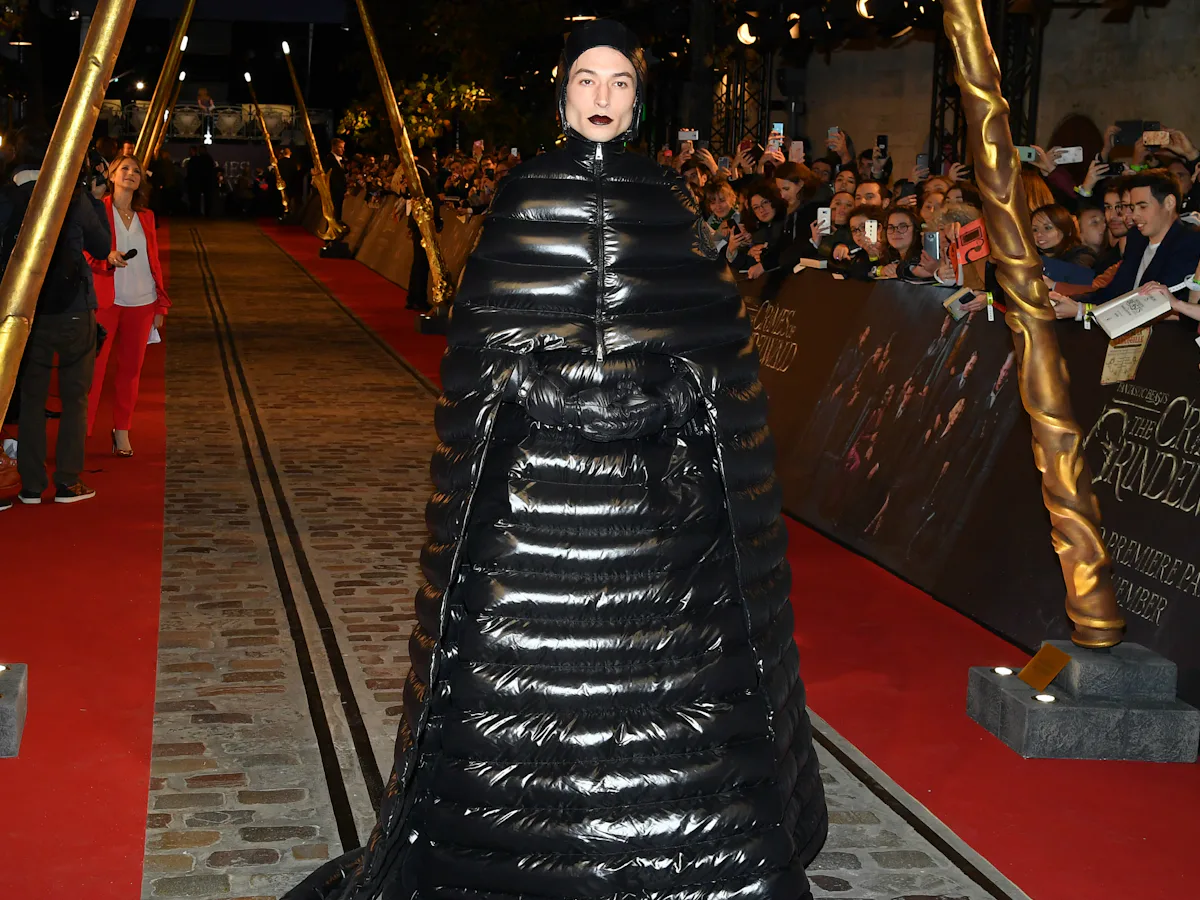 Ezra Miller Wearing A Designer Sleeping Bag Is A Cozy Goth Fantasy