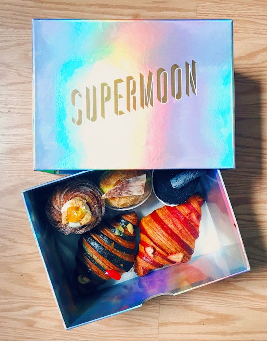 Cruffins and croissants placed in a Supermoon Bakehouse takeaway box 