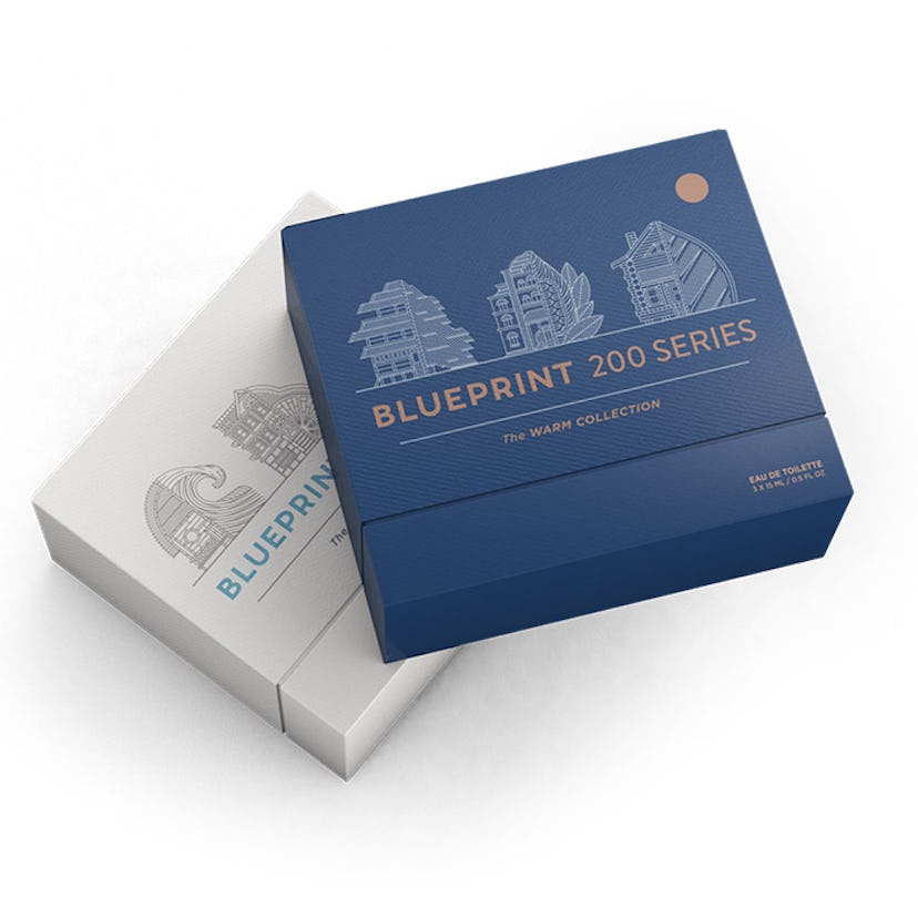 Two boxes of Blueprint Cologne in blue and in white for their Fresh and Warm lines