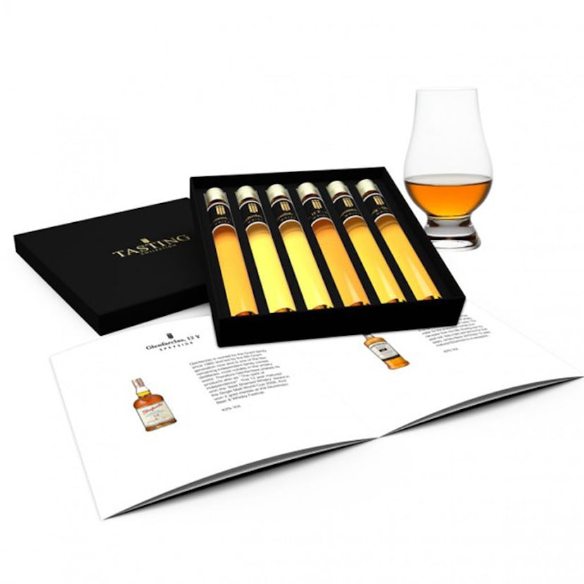 Tasting Collection's Whisky Tasting Collection with six samples of whisky in a black box, next to a ...