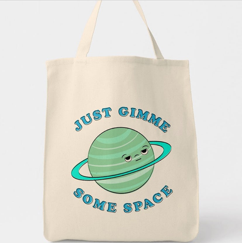 Low Star Studio's Just Gimme Some Space Cute Tote Bag in beige with a green planet that has a face o...