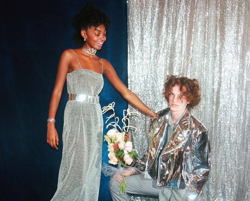 Matching silver couple, Onah wearing an Assembly dress and Isaac wearing a Topshop jacket and a Calv...