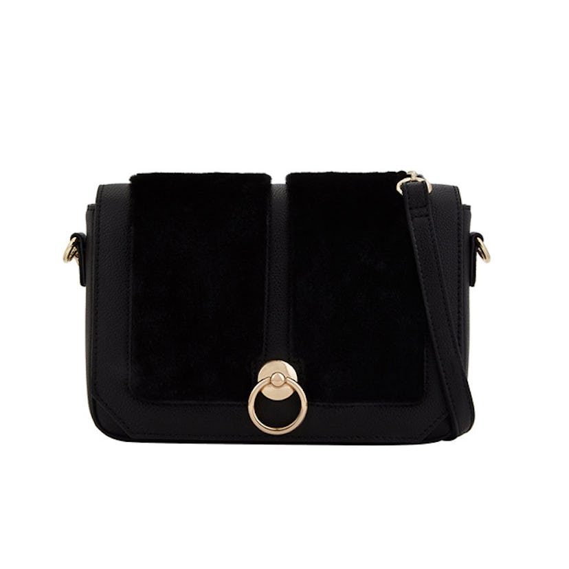 Call It Spring, Brerassa: a simple black purse with golden details