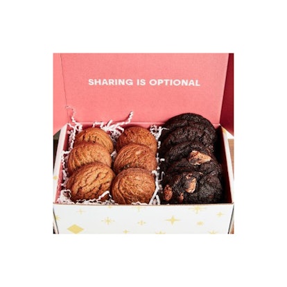 Oven baked black and brown gluten-free cookies served in a white and pink box