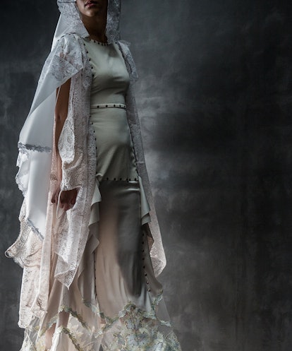 An off-white dress by designer Yuima Nakazato, created sustainably after being inspired by space sui...