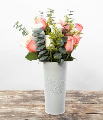 The Bouqs Co. x Bobby Berk's Beauty-Full bouquet of white and pink roses in a white pot 