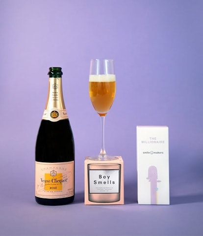 Saucey's Self-Love Bundle with Rosé champagne, a candle and a "Smile Makers" vibrator