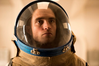 Robert Pattinson from "High Life", a new movie from Claire Denis, in an astronaut outfit