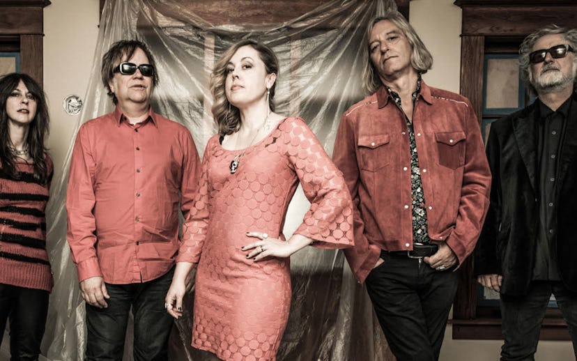 Members of the Sleater-Kinney rock band posing for a photo