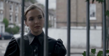 Jodie Comer wearing a black jacket with puffed sleeves in a scene of Killing Eve