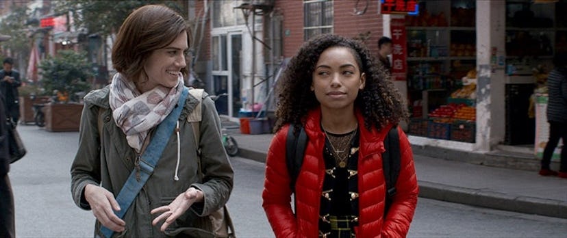 Allison WIlliams and Logan Browning in a scene of the movie 'Perfection' walking down a road