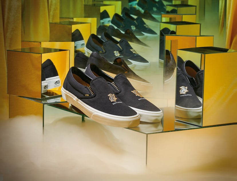 A pair of Vans shoes designed in Hufflepuff  style - yellow and black 