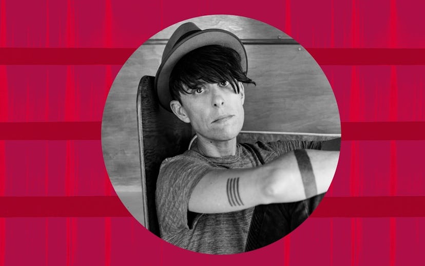 Andrea Gibson in a black and white photo for the cover of NYLON's entertainment article