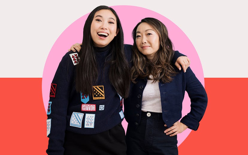 Lulu Wang and Awkwafina posing with their arms over each others shoulders