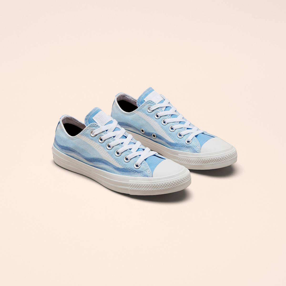 Millie bobby clearance brown whale converse