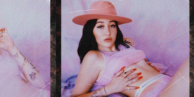 Noah Cyrus in a pink top with a pink hat in a retro picture.