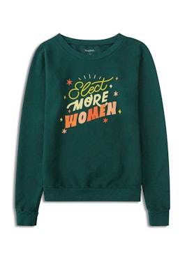 A green ModCloth shirt that has the words "Elect More Women" on it made to promote women's equality
