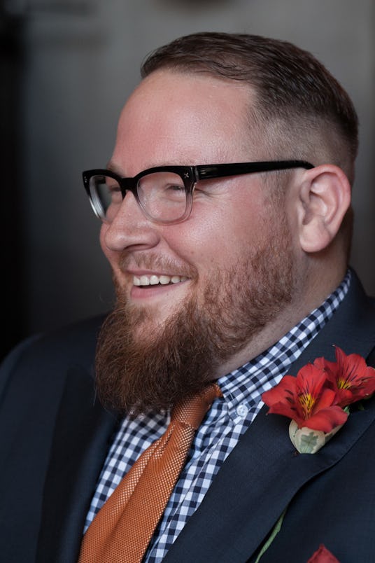 Founder of Chubstr.com, Bruce Sturgell wearing a suit with a flower in it