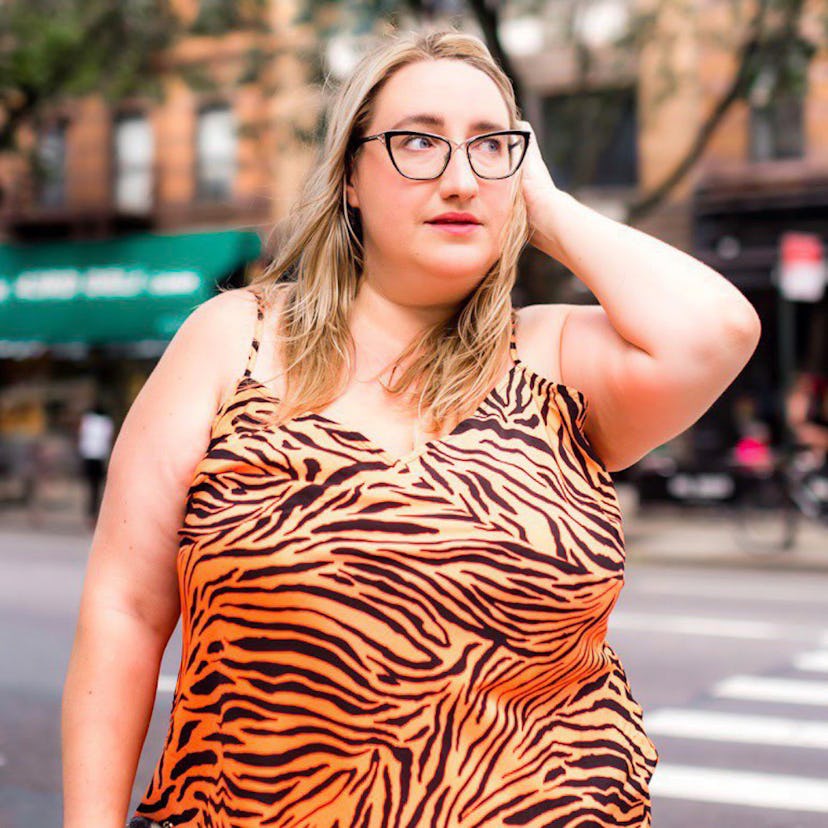 Influencer and founder of Curvily, Sarah Chiwaya wearing a tiger inspired dress