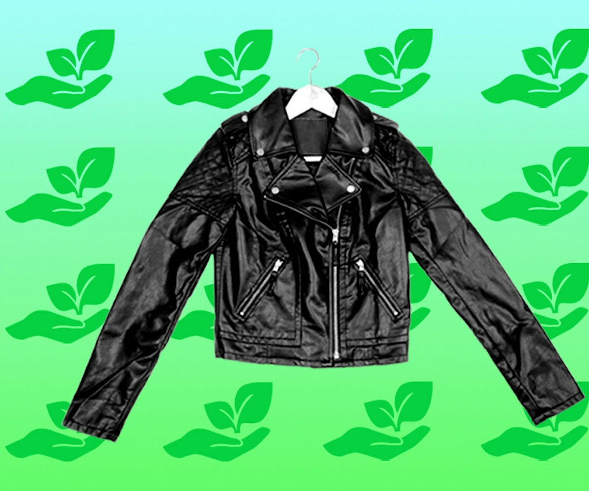 Vegan leather jacket on a hanger in front of an ecofriendly pattern background
