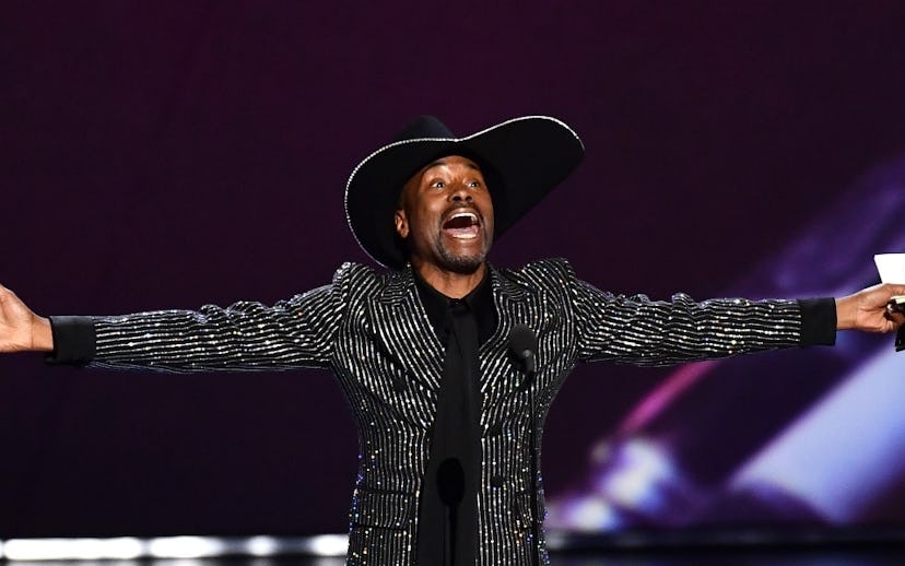 Billy Porter winning an Emmy award and celebrating on stage