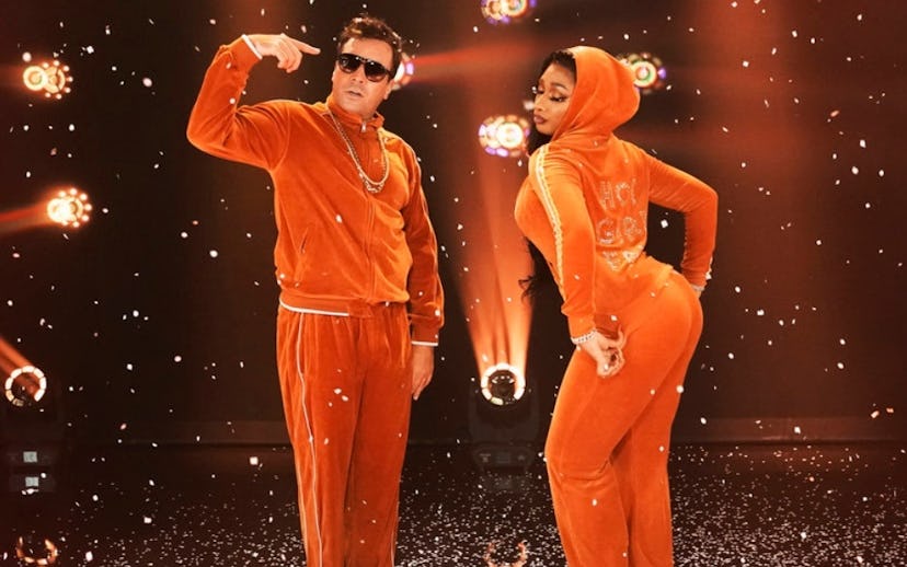 Jimmy Fallon and Megan Thee Stallion in the orange plush tracksuits for a "Hot Girl Fall"