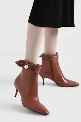 Brown leather ankle boots with a narrow heel